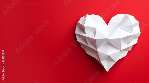 Heart made from white paper on the red background. Copy space. Happy Valentine's Day banner.