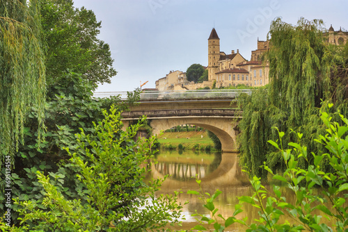 Summer city landscape - view of the bridges over the River Gers in the town of Auch, in the historical province Gascony, the region of Occitanie of southwestern France photo