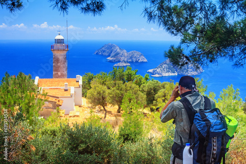 Coastal summer landscape - view of the lighthouse on the Cape Gelidonya, Antalya Province in Turkey photo