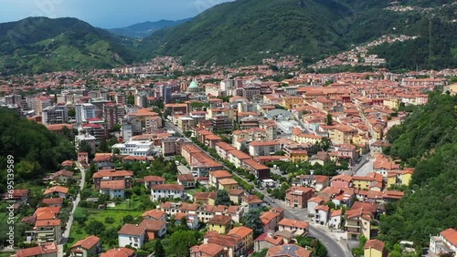 Aerial video of Massa, a city located at the foot of the Apuan Alps Regional Natural Park in the Apennines in Tuscany, Carrara. Italy photo