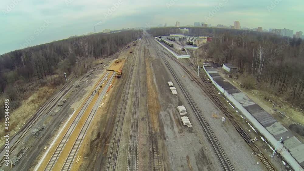 Construction site of railroad tracks among forest Construction site of railroad tracks among forest