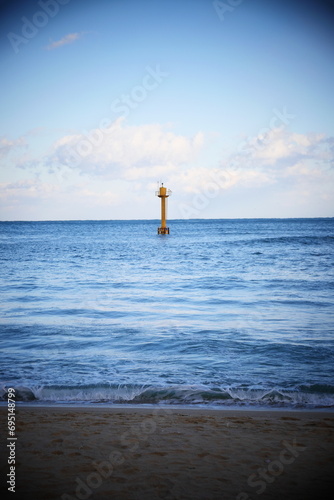 beach of East sea with waves in south korea photo