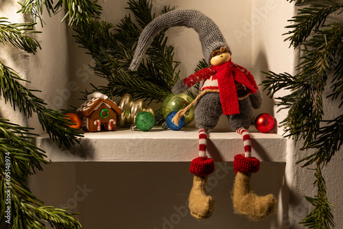 Christmas elf sitting on a shelf