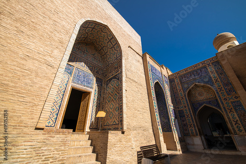 Symmetrical decorative ornament of entrance to the tomb in Shah-I-Zinda photo