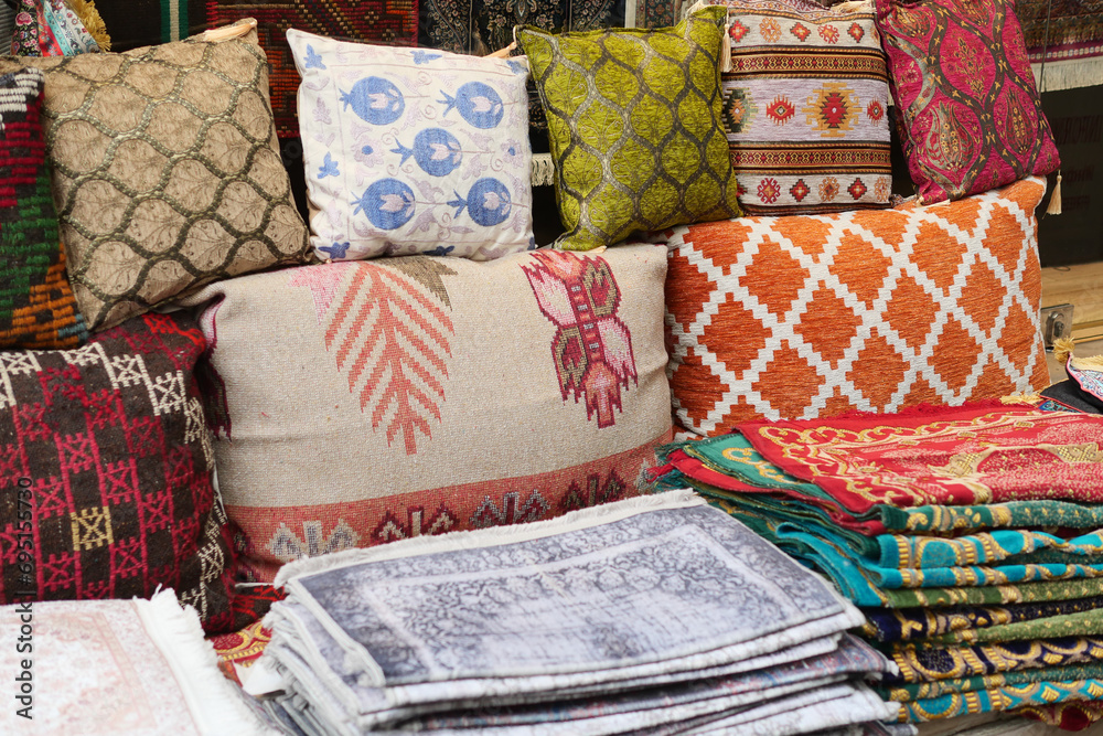 Colourful cushions on display for sale in a traditional Turkish Bazaar. Colourful cushions on display for sale in a traditional Turkish Bazaar.