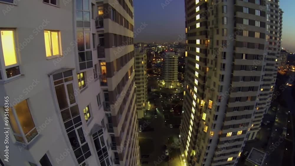 Residential complex with illumination against megalopolis