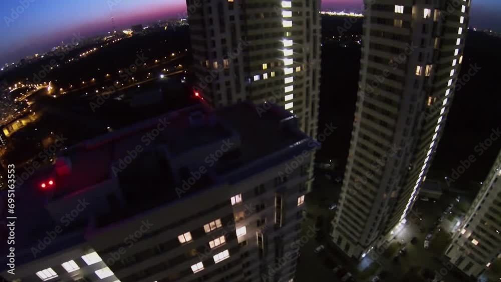 Roof of residential house against cityscape at evening. Roof of residential house against cityscape at evening.