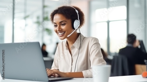 Smiling professional with headset at modern office workspace, ideal for customer service themes.