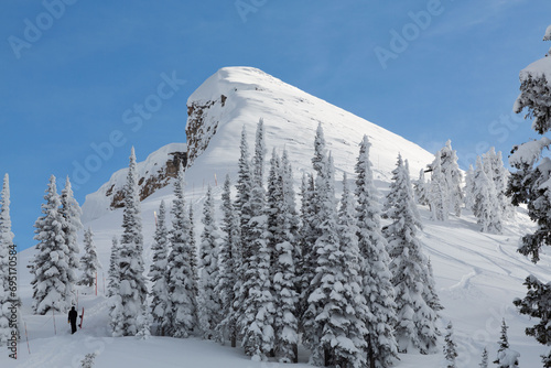 The Teton Range is a mountain range of the Rocky Mountains in North America. It extends for approximately 40 miles in a north–south direction through the U.S. state of Wyoming, east of the Idaho. photo