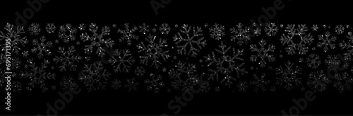 Christmas poster with shiny black glittering snowflakes on black background.