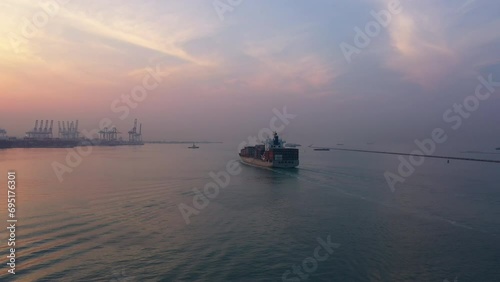 Aerial top view of Container ship loading and unloading, Cargo container in deep seaport for the international order concept.