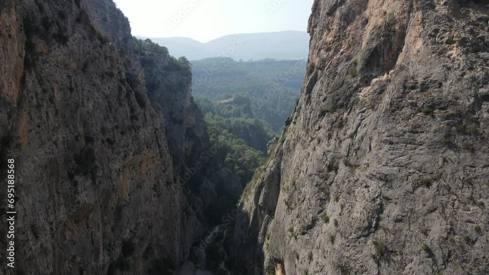Cliff rocks in mountains, drone view of cliffs formed by sharp hard rocks, cliffs formed by rocks, drone view of gray sharp rocks in mountains