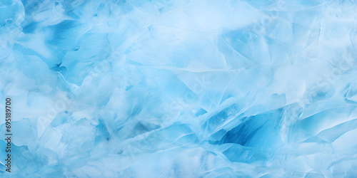 Beautiful original background texture in a wide format in light blue tones of the surface with the texture of ice or stone
