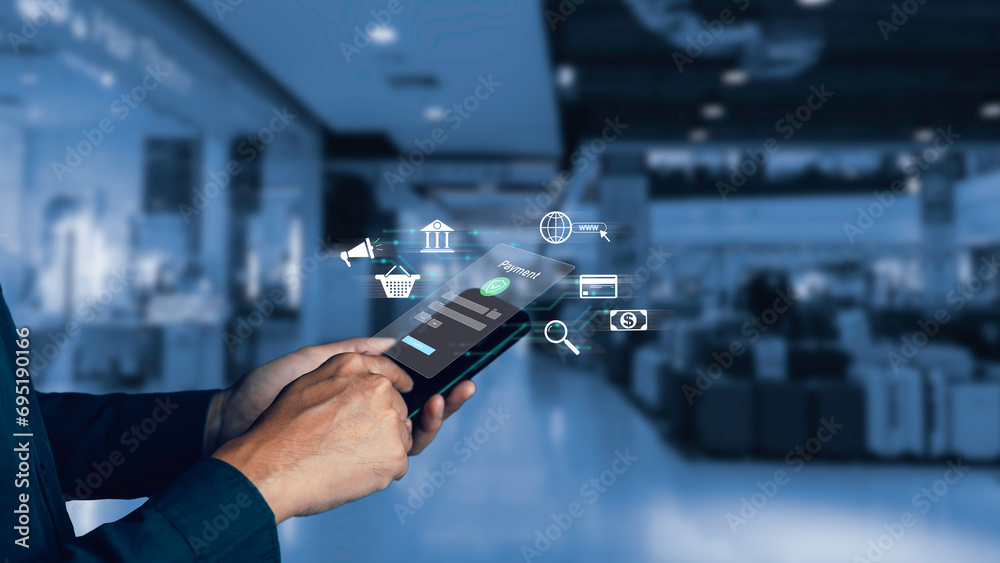 Buy now pay later online shopping concept. Hands holding mobile phone on blurred store as background. Online shopping. Paying after delivery. Complete the payment after purchase at no added cost.