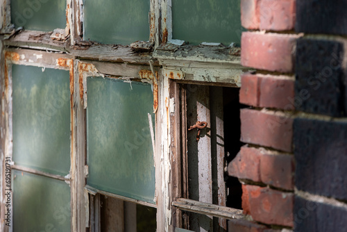 An old broken and dilapidated window