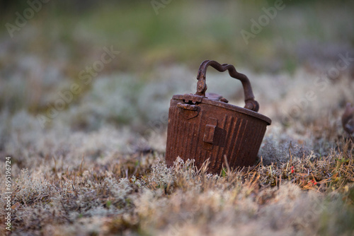Old machine gun part rusted in Finnish Lapland