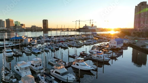 Freedom Boat Club in Portsmouth with a view of downtown Norfolk, Virginia skyline during sunrise. Holiday Harbor on Elizabeth River. photo