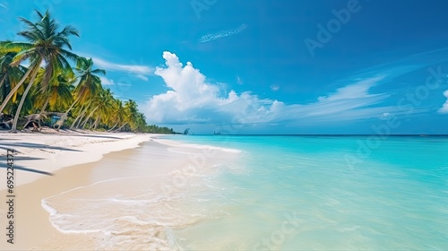 Beautiful tropical beach with white sand and palm trees © paisorn