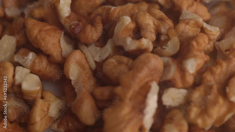 Moth Larvae Crawling On Walnuts - Close Up Moth Larvae Crawling On Walnuts - Close Up