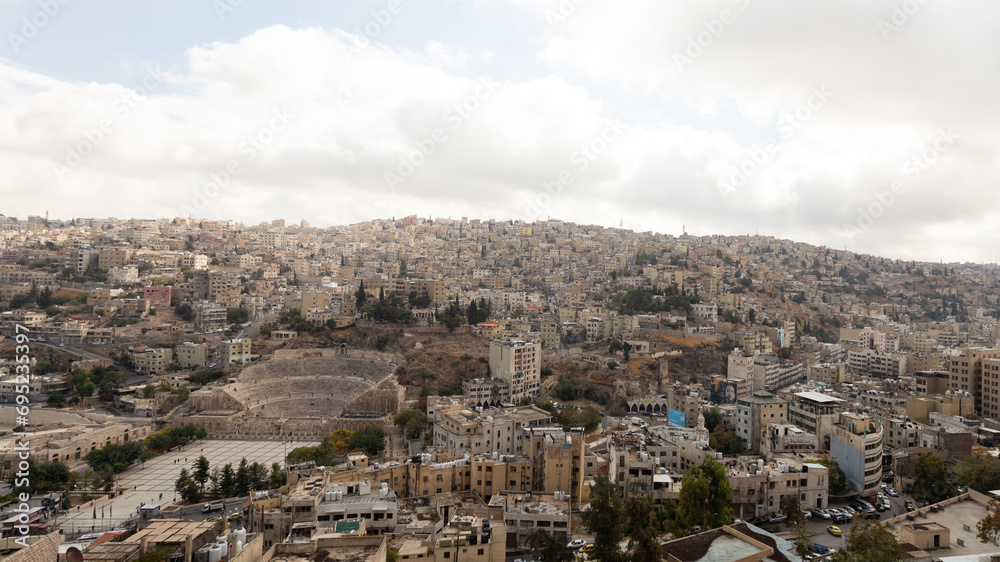 Panoramic view of ancient roman theater, and Amman's cityscape