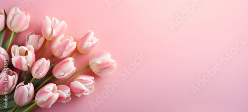 Beautiful composition spring flowers. Bouquet of pink tulips flowers on pastel pink background. © Lucky Ai