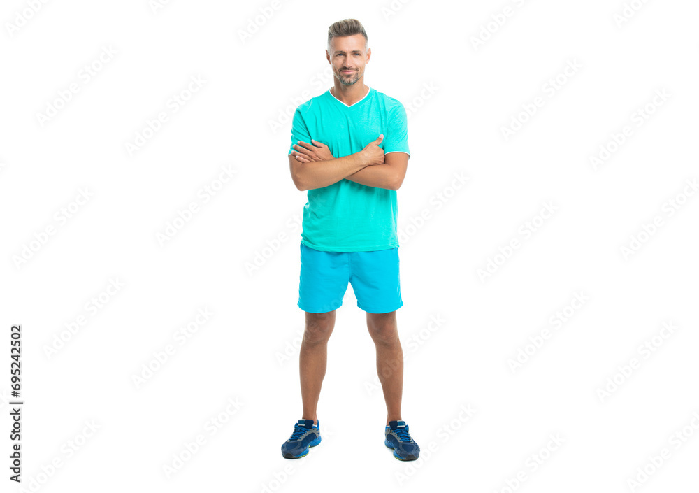 fitness work out in the gym of man training. full length of fitness man after exercising. fit man wearing fitness clothes isolated on white background. Handsome man doing sport in fitness studio