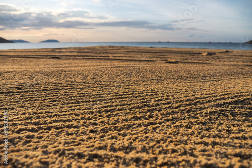 Sea sand is raked smooth at a coastal resort in Da Nang, Vietnam