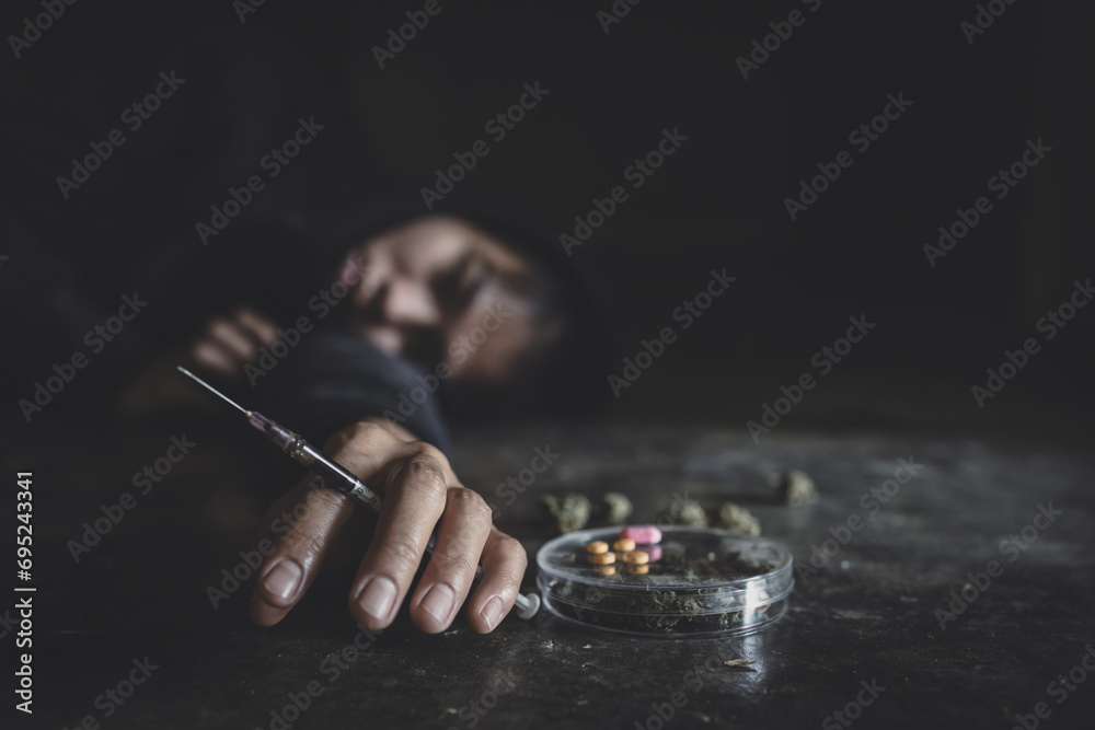  The concept of people addicted to drugs and against the use of illegal drugs. Drugs addiction and withdrawal symptoms concept. drugsInternational Day against Drug Abuse. - obrazy, fototapety, plakaty 