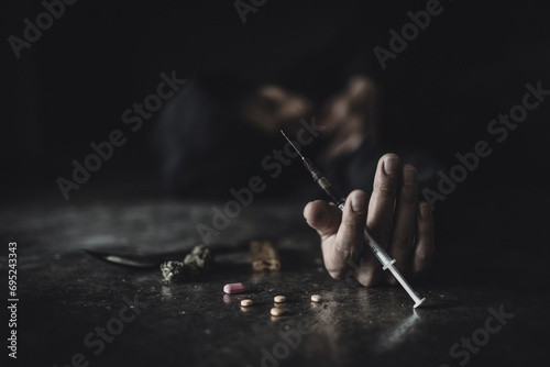  The concept of people addicted to drugs and against the use of illegal drugs. Drugs addiction and withdrawal symptoms concept. drugsInternational Day against Drug Abuse. photo