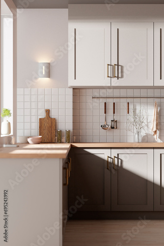 Fototapeta Naklejka Na Ścianę i Meble -  A bright beige-toned kitchen interior with sunlight 
coming through the window.