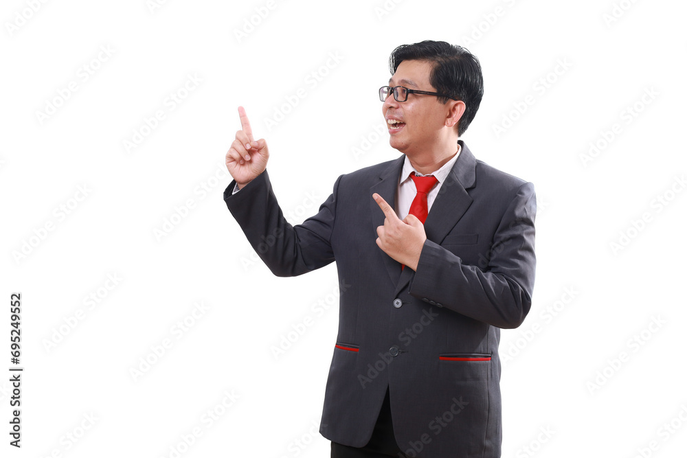Happy asian businessman standing while pointing sideways. Isolated on white Happy asian businessman standing while pointing sideways. Isolated on white