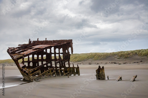 Wreck of the Peter Iredale at Fort Stevens State Park in Oregon photo