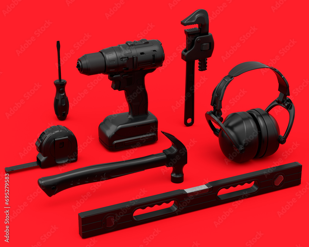 Top view of monochrome construction tools for repair on red background Top view of monochrome construction tools for repair on red background