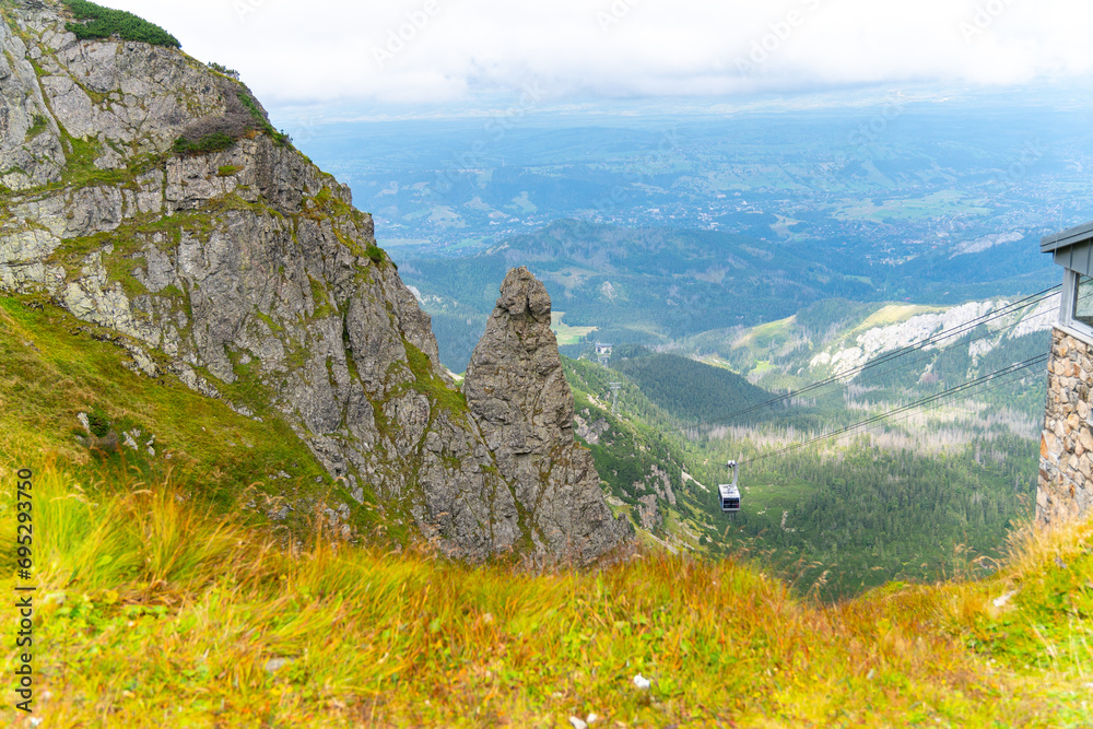 Fototapeta premium cable car lifting you mountains to the top of Kasprowy Wierch Poland