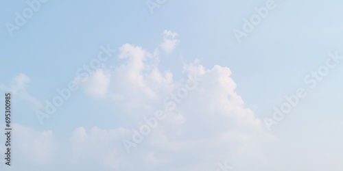 White cloud in the sky. View on a soft white fluffy cloud as background. Cloudy sky, white clouds, black background pattern. The gray cloud trendy photo. White sky image	