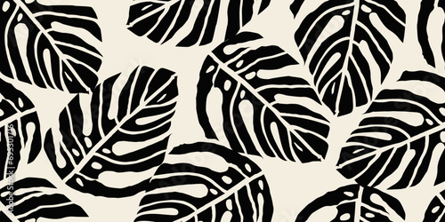 Monstera leaf seamless pattern. Hand drawn tropical leaves. Modern print in black and white color. natural ornaments for textile, fabric, wallpaper, home decor, background.