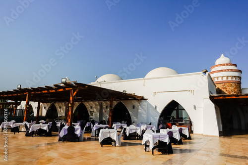 restaurant with lot of free places and blue sky in the summer