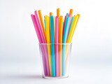  color straws in plastic cup on white background