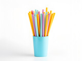 different type color straws in paper cup on white background