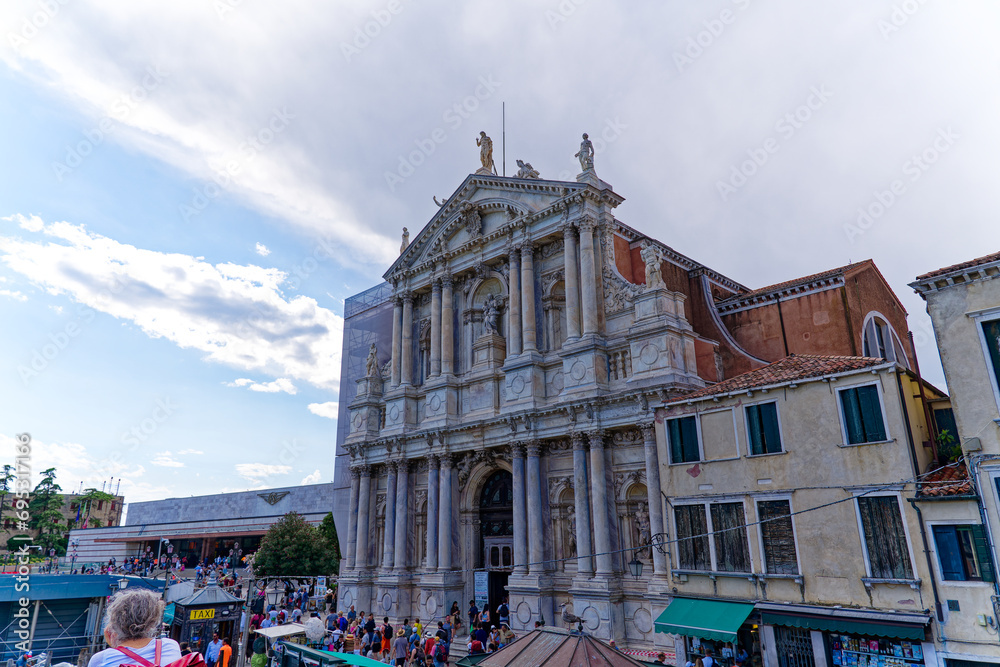 Old town of City of Venice with church named Santa Maria di Nazareth in backlight with scaffolding on a blue cloudy summer day. Photo taken August 6th, 2023, Venice, Italy.