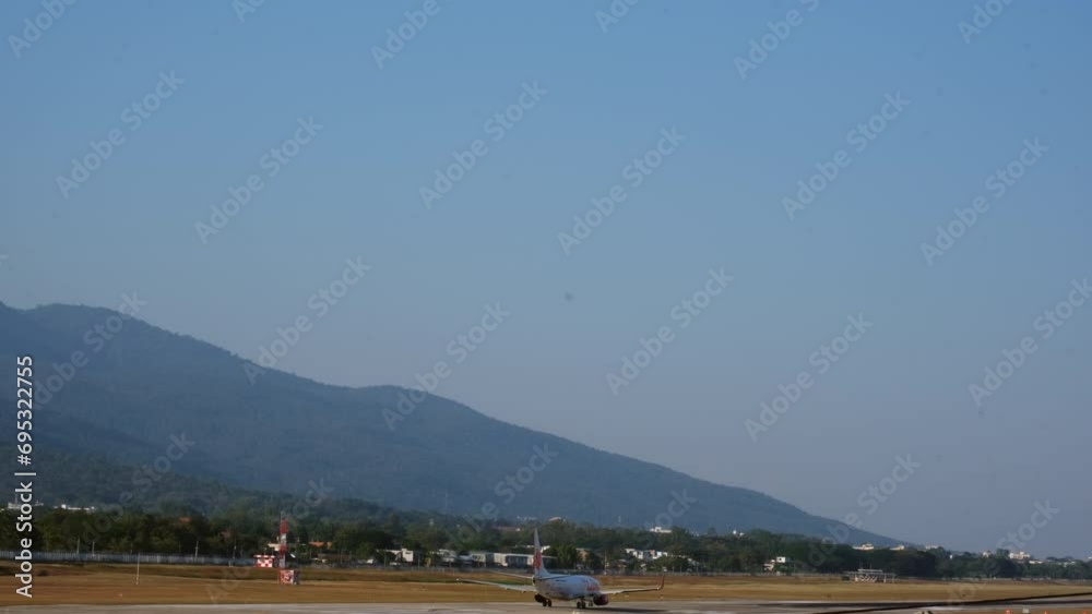 A passenger plane ready to take off. Airplane on runway. Runway at the airport and the plane flies and landing. A passenger plane ready to take off. Airplane on runway. Runway at the airport and the plane flies and landing.