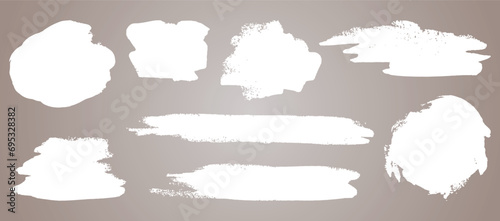 Abstract vector paint set. Isolated grunge elements for paper design. Ink paint brush stains or spots on light background