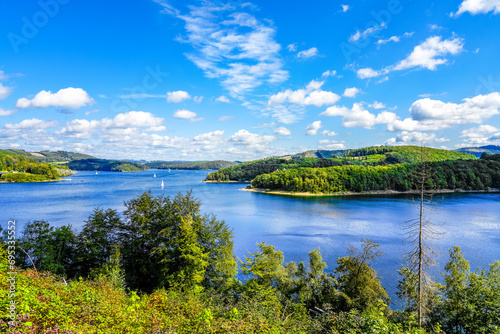 View of the Biggesee near Attendorn in the Olpe district with the surrounding nature. Landscape by the lake in the Sauerland. Bigge Dam. 