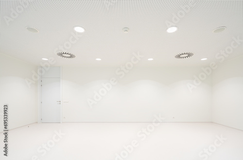 White room with closed door in hospital