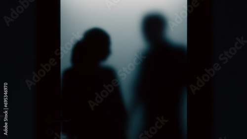 A woman is being threatened by a man through opaque glass., 3d rendering