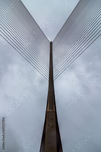 Symmetrical view of a towering suspension bridge photo