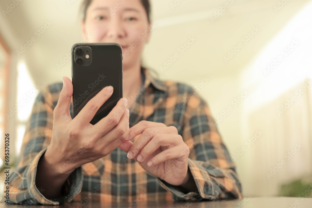 woman using cell phone hand holding mobile texting message contact us.chatting,search internet information.technology device communication connecting woman using cell phone hand holding mobile texting message contact us.chatting,search internet information.technology device communication connecting