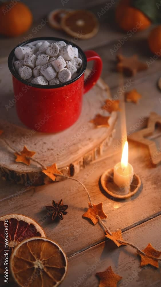 cute cozy winter composition 2024. red mug, marshmallows, Christmas lights and candle. new year and christmas, warmth, comfort, cozy cute cozy winter composition 2024. red mug, marshmallows, Christmas lights and candle. new year and christmas, warmth, comfort, cozy