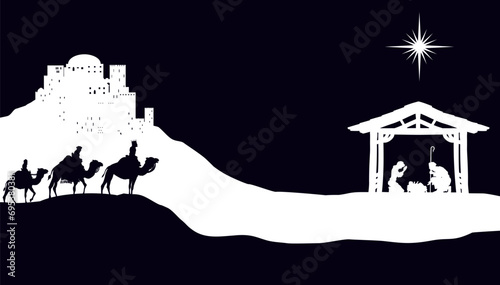 A Christmas nativity scene with baby Jesus in the manger, wise men and city of Bethlehem in the background