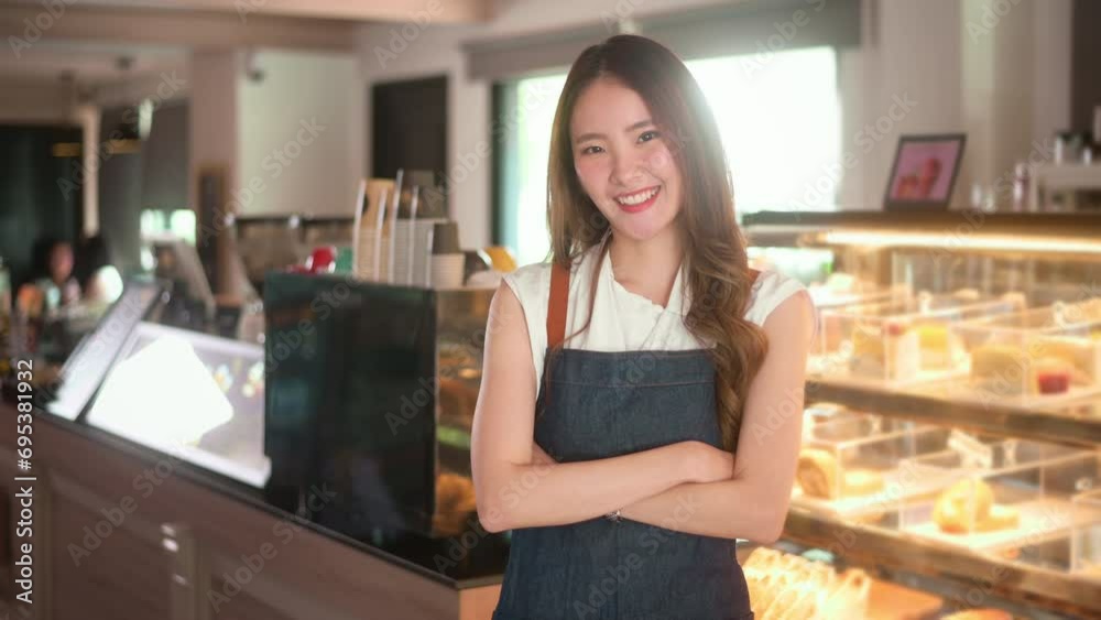 An Asian woman entrepreneur or barista working in modern coffee shop , concept small business An Asian woman entrepreneur or barista working in modern coffee shop , concept small business